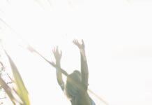 일상 속으로 스며든 웰니스 문화, 건강한 삶을 위한 실천법은? woman standing near body of water